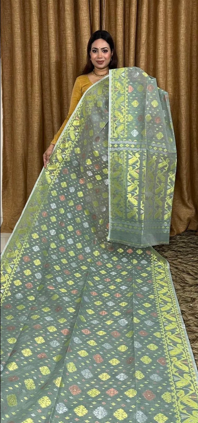 green-toned Dhakai Jamdani saree